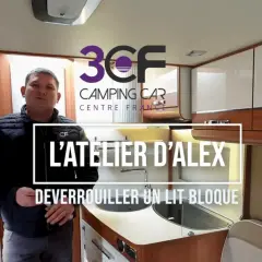 Alex explique comment faire descendre un lit électrique bloqué dans un camping-car.