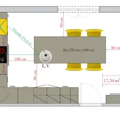 Plan de cuisine avec îlot central, évier, plaque de cuisson et réfrigérateur. L'espace autour de la table est optimisé pour un triangle d'activité fonctionnel.