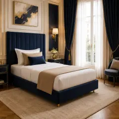 Chambre luxueuse avec lit bleu marine, idéal pour une personne. La largeur matelas 1 place est parfaite pour ce couchage élégant.