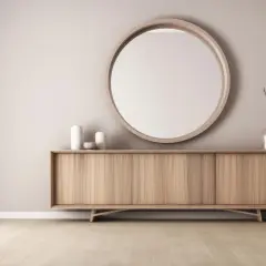 Un miroir rond et des vases minimalistes : des idées pour que mettre au dessus d'un buffet.