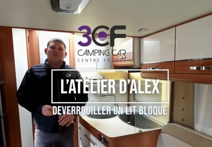 Alex explique comment faire descendre un lit électrique bloqué dans un camping-car.