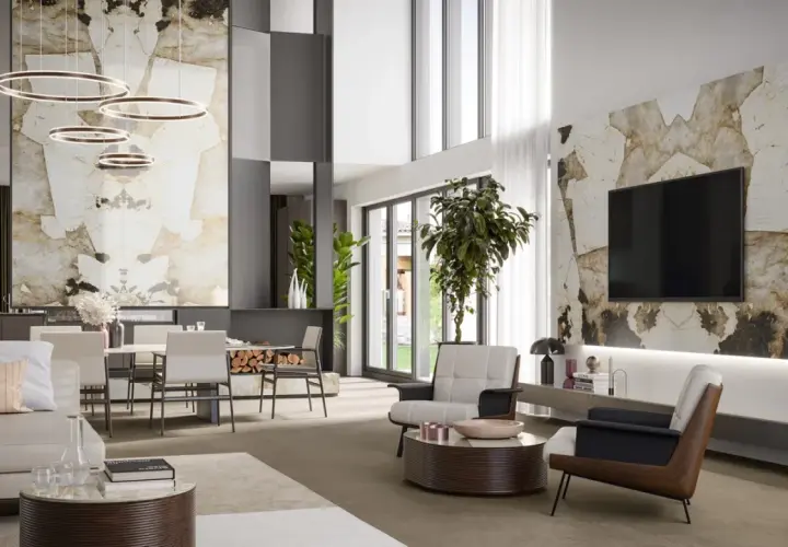 Un salon moderne avec une grande etagere sejour, un canapé, des fauteuils, une table basse et une télévision murale.