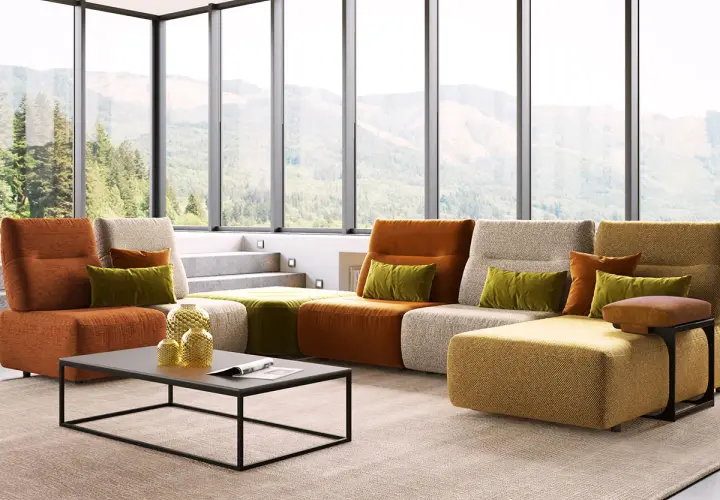 Un salon moderne avec un canapé modulaire aux couleurs vives. Le canapé réversible, signification de flexibilité, s'adapte à tous les espaces.