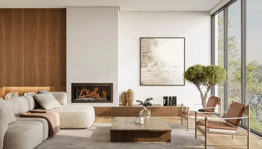 Salon moderne avec cheminée, canapé confortable et vue sur la nature. La hauteur du canapé est parfaite pour se détendre.