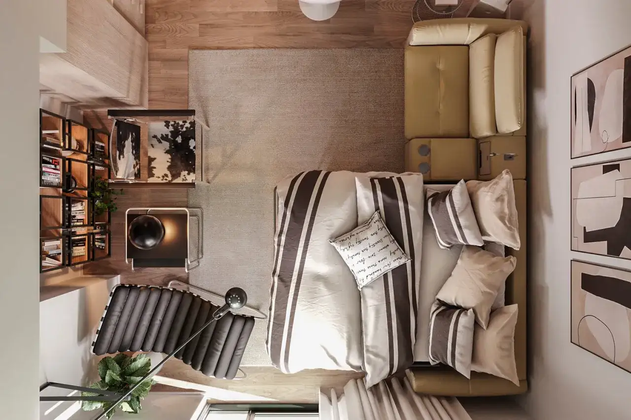 Vue aérienne d'une chambre moderne avec un canapé-lit jaune, un lit rayé, une bibliothèque et un fauteuil design.